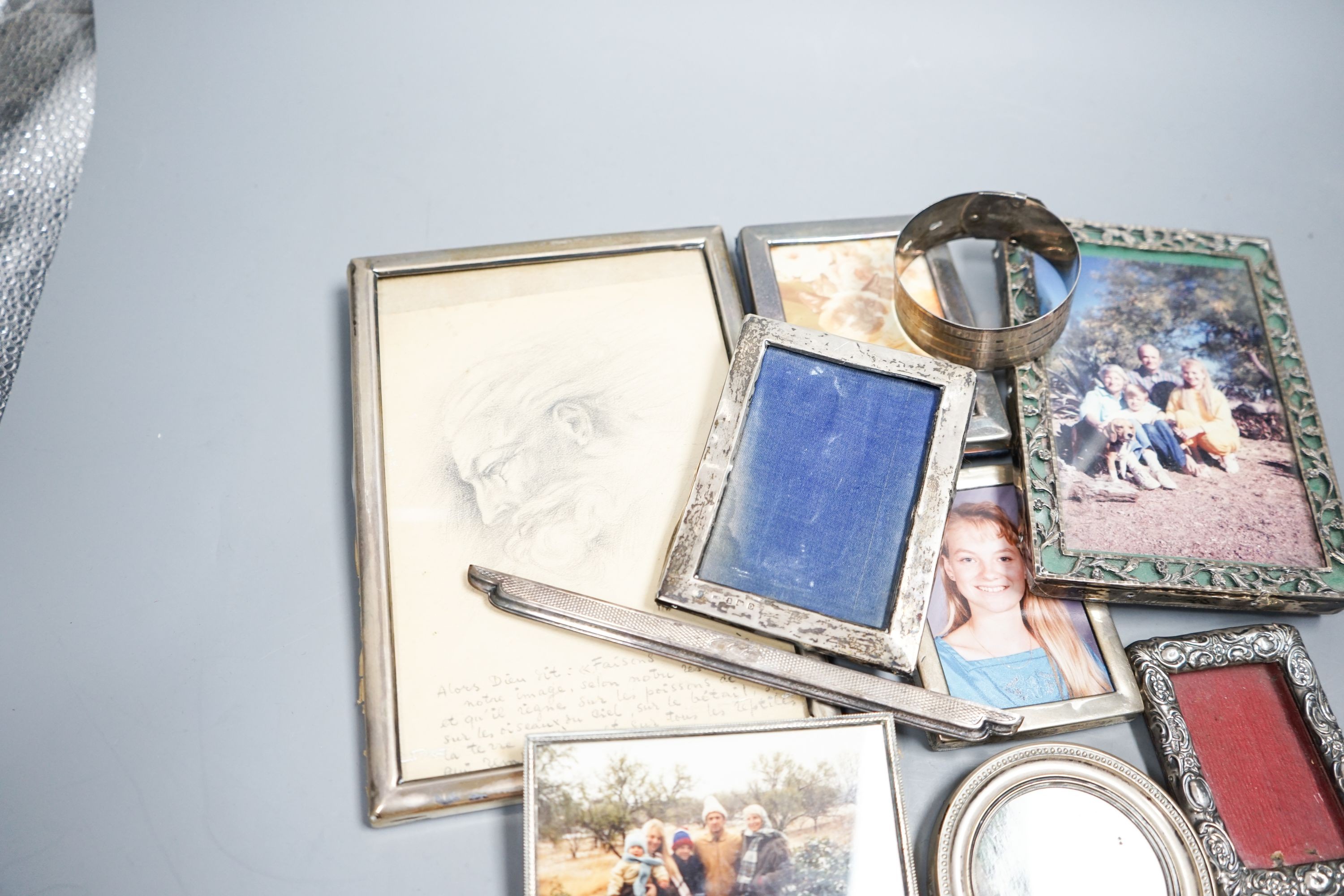 Various silver mounted photograph frames and a silver bangle